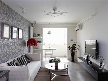 整个室内空间装修风格为现代简约风格，整个空间以白色